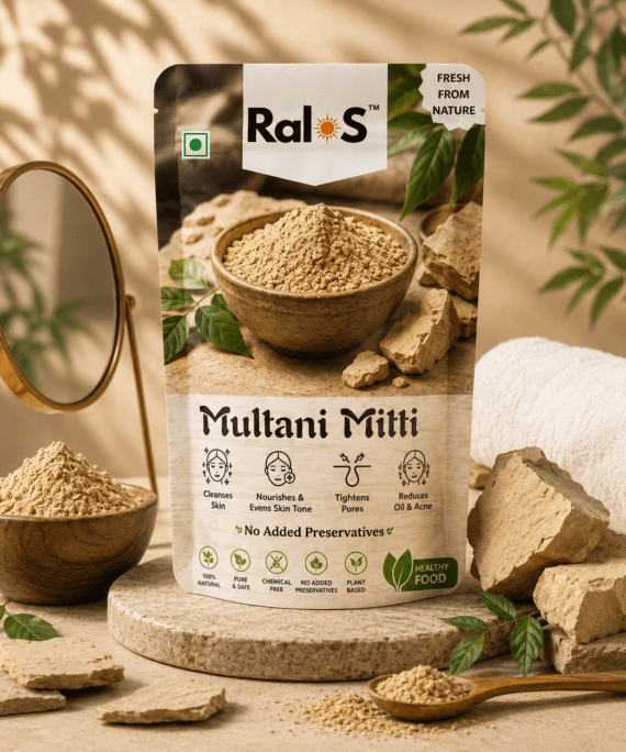 Ralos Multani Mitti Powder with clay pieces and powder on luxury beige spa-inspired background