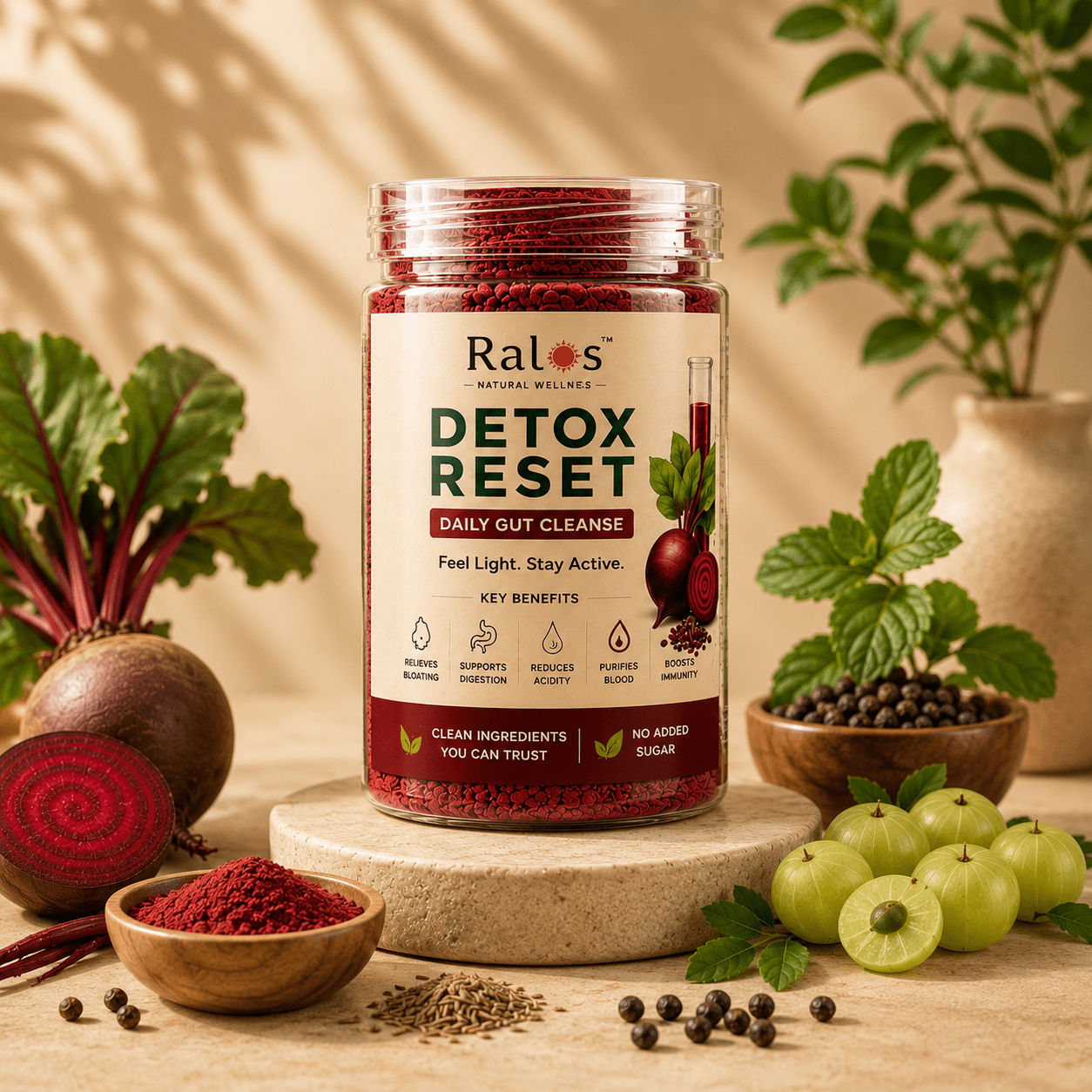 Ralos Detox Reset powder displayed with beetroot, amla and natural ingredients on a premium wellness background