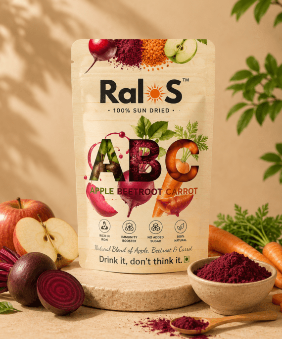 Ralos ABC Powder made from Apple Beetroot and Carrot displayed on a premium beige wellness background with fresh ingredients