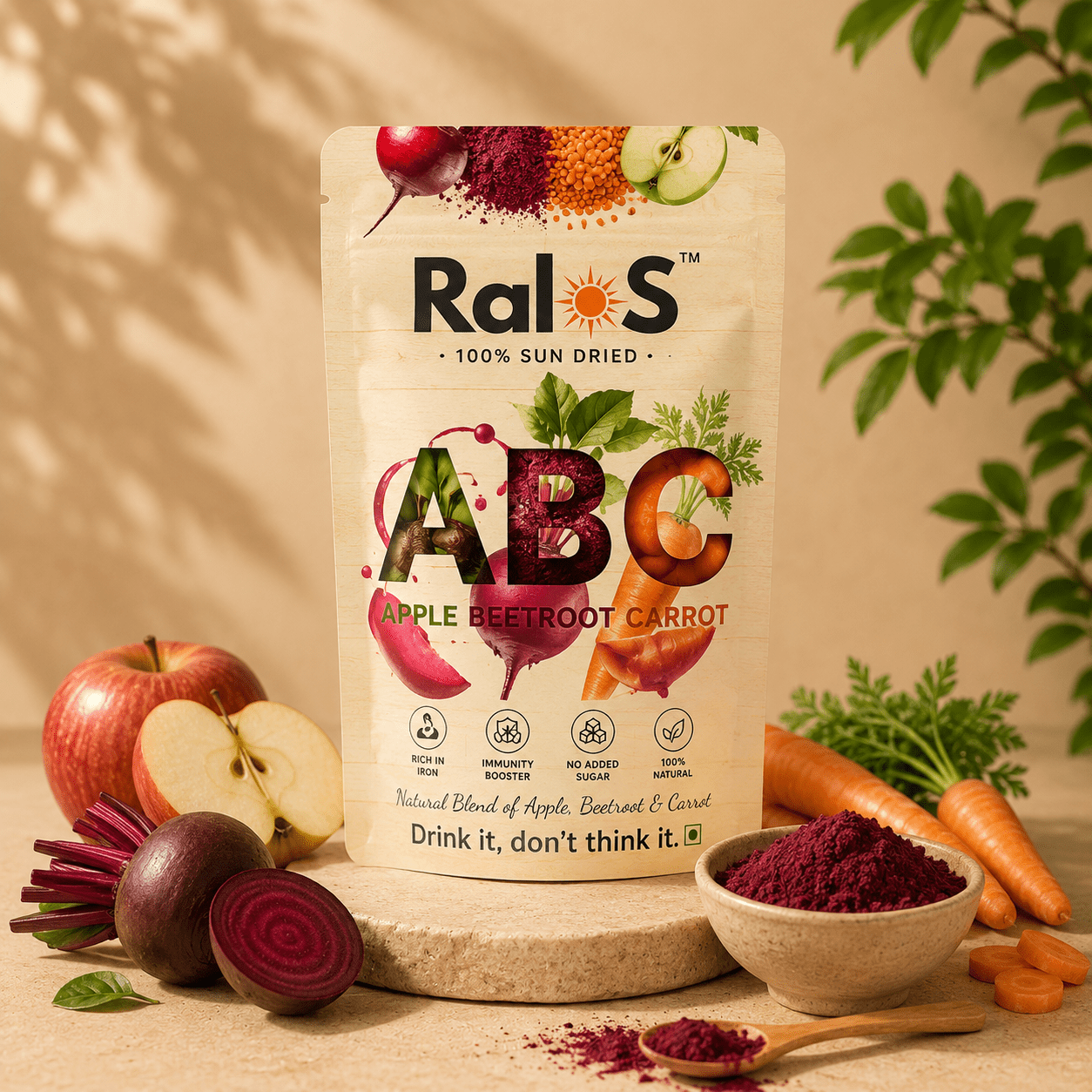 Ralos ABC Powder made from Apple Beetroot and Carrot displayed on a premium beige wellness background with fresh ingredients
